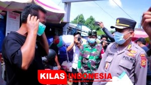 Kabid Humas Polda Bali Berikan Edukasi Prokes Covid-19 di Pasar Dauh Pala Tabanan