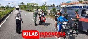 Tegakkan Protokol Kesehatan, Kodim 1715/Yahukimo Turun ke Jalan